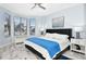 Bright main bedroom with king-size bed, marble floors, and bay window at 4624 Harbour Village Bv # 4205, Ponce Inlet, FL 32127