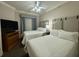 Guest bedroom with two double beds and a TV at 8495 Miracle Dr # 202, Champions Gate, FL 33896