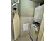 Convenient laundry room with a washer and dryer at 8495 Miracle Dr # 202, Champions Gate, FL 33896