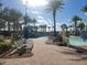 Relaxing pool area with lounge chairs at 8495 Miracle Dr # 202, Champions Gate, FL 33896