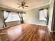 Bright bedroom with wood flooring and ceiling fan at 2441 Prairie Dunes, Clermont, FL 34711