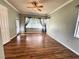 Relaxing bedroom with wood flooring and window at 2441 Prairie Dunes, Clermont, FL 34711