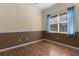 Light and airy bedroom with wood floors and window at 2441 Prairie Dunes, Clermont, FL 34711