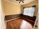 Well-lit bedroom with hardwood floors and neutral decor at 2441 Prairie Dunes, Clermont, FL 34711