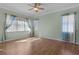 Spacious bedroom with wood floors and window coverings at 2441 Prairie Dunes, Clermont, FL 34711