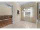 Bright breakfast nook with tile floor and window seating at 2441 Prairie Dunes, Clermont, FL 34711