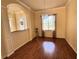 Spacious dining area with hardwood floors and natural light at 2441 Prairie Dunes, Clermont, FL 34711