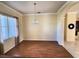 Formal dining room with hardwood floors and chandelier at 2441 Prairie Dunes, Clermont, FL 34711