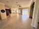 Open kitchen features island and tile flooring at 2441 Prairie Dunes, Clermont, FL 34711