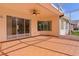 Screened lanai with tile flooring and ceiling fan at 2441 Prairie Dunes, Clermont, FL 34711