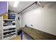 Versatile storage room with ample shelving, perfect for organization and keeping your home clutter-free at 1635 Hilltop Dr, Mount Dora, FL 32757