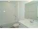 Bathroom with tub, vanity, and toilet at 2099 Keystone Pass Blvd, Minneola, FL 34715