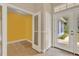 Bright entryway featuring neutral walls, tile flooring, and a view of the outdoors at 23321 N Buckhill Rd, Howey In The Hills, FL 34737