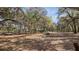 Lot with mature trees offering privacy and natural beauty, with building spots at 23321 N Buckhill Rd, Howey In The Hills, FL 34737