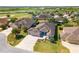 Desirable home with meticulously landscaped yard, screened pool, and convenient three-car garage at 1786 Red Clover Ln, The Villages, FL 32163