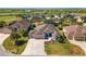 Beautiful home with a well-manicured lawn and a screened-in pool, in a desirable neighborhood at 1786 Red Clover Ln, The Villages, FL 32163