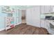 Well-lit office with Murphy bed and built-in desk at 1786 Red Clover Ln, The Villages, FL 32163