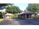 Convenient community ATM with adjacent building and surrounding greenery provides easy access to banking services at 4953 Glen Coe St, Leesburg, FL 34748