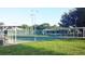 Community shuffleboard courts surrounded by lush landscaping offer recreational opportunities for active residents at 4953 Glen Coe St, Leesburg, FL 34748