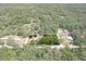 Aerial view showing home's location in wooded area at 4422 Cr 690, Webster, FL 33597