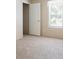 Bright bedroom with carpet and a closet at 4422 Cr 690, Webster, FL 33597