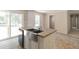 Modern kitchen featuring a farmhouse sink and island at 4422 Cr 690, Webster, FL 33597