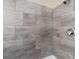 Clean shower with gray tile and modern fixtures at 4422 Cr 690, Webster, FL 33597