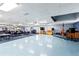 Large recreation room with stage, piano, sound equipment, and ample seating at 122 Baytree Blvd, Tavares, FL 32778