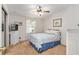 Cozy bedroom with a double bed and ceiling fan at 1653 Kiley Ct, The Villages, FL 32159