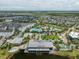 Aerial view of community with lake and amenities at 10125 Gobat Aly, Orlando, FL 32827