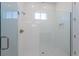 Walk-in shower with glass enclosure and modern fixtures at 10125 Gobat Aly, Orlando, FL 32827