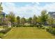 Lush community park with walking paths, green lawns, and landscaping for relaxation and recreation at 10218 Dulbecco St, Orlando, FL 32827