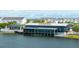 Waterfront restaurant with outdoor seating offers scenic views and adds to community amenities at 10218 Dulbecco St, Orlando, FL 32827