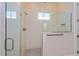 Large walk-in shower with glass enclosure at 10260 Medawar St, Orlando, FL 32827