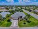 Beautiful single-story home with well-manicured landscaping and an expansive driveway perfect for multiple vehicles at 1751 Ashwood Run, The Villages, FL 32162