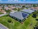 Well maintained single story home with mature landscaping and solar panels at 1751 Ashwood Run, The Villages, FL 32162