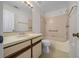 Clean bathroom with shower, toilet and vanity at 6299 River Run Pl # 198, Orlando, FL 32807