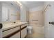 Clean bathroom with tub shower, toilet and vanity at 6299 River Run Pl # 198, Orlando, FL 32807