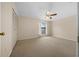 Well-lit bedroom featuring a ceiling fan and large closet at 6299 River Run Pl # 198, Orlando, FL 32807
