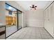 Spacious dining area with tile floors and access to a patio at 6299 River Run Pl # 198, Orlando, FL 32807