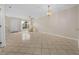 Spacious living room with tile floors and natural light at 6299 River Run Pl # 198, Orlando, FL 32807
