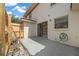 Small patio with concrete flooring and wooden fence at 6299 River Run Pl # 198, Orlando, FL 32807