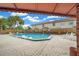 Refreshing community swimming pool with lounge chairs at 6299 River Run Pl # 198, Orlando, FL 32807