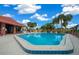 Inviting community pool with a spacious deck area at 6299 River Run Pl # 198, Orlando, FL 32807