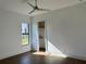 Bright bedroom with wood floors and a walk-in closet at 16122 Pendio Dr, Bella Collina, FL 34756