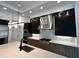 Sleek kitchen with dark cabinetry and a gas cooktop at 16122 Pendio Dr, Bella Collina, FL 34756