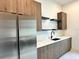 Laundry room with washer, dryer, and ample counter space at 16122 Pendio Dr, Bella Collina, FL 34756