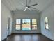 Bright living room with large windows overlooking the pool at 16122 Pendio Dr, Bella Collina, FL 34756