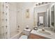 Bathroom with shower and palm tree decor at 8043 Pine Hollow Dr, Mount Dora, FL 32757