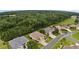 Aerial view of houses and a wooded area at 16984 Se 109Th Ave, Summerfield, FL 34491